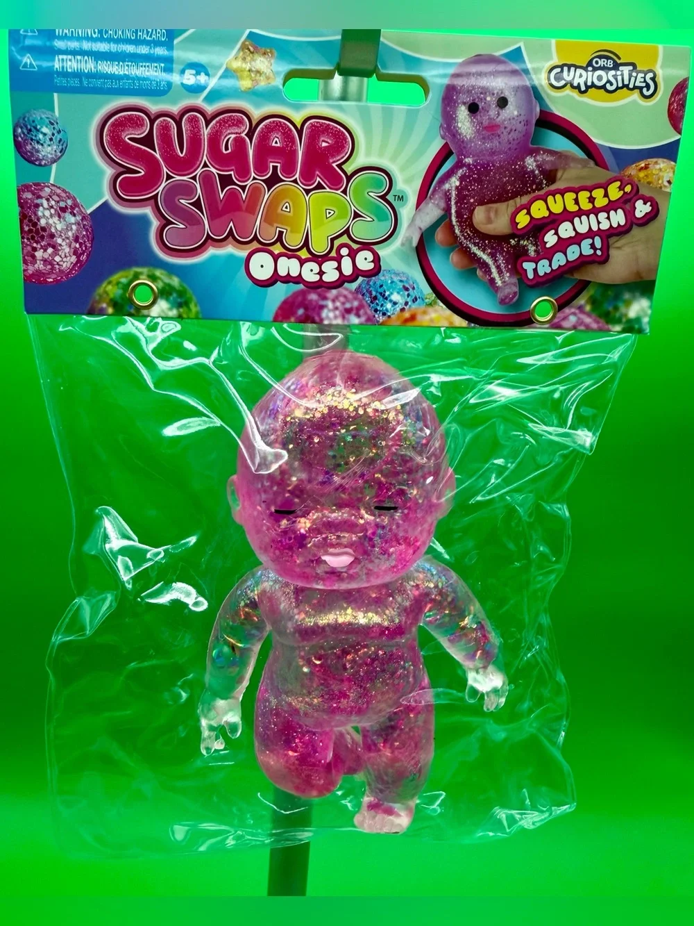 Sugar Swaps Onesie Squeeze Toy - Pink Glitter